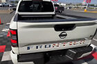 Distressed US flag letters fits NISSAN FRONTIER 2022 23 logo tailgate insert