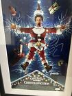 Chevy Chase signed Christmas Vacation 11x17 poster Mated And Framed Beckett COA