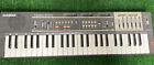 Casio Casiotone MT-100 1985 Vintage Electric Keyboard With Music Books