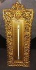 Vintage  brass wall thermometer,  15'' long by 6'' wide, gold in color,