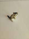 New ListingVintage Miniature Black And White Playful Kitty Cat Holding Up Its Paw Figurine