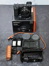 Sony Alpha a6400 4K UHD 16-50mm Lens W/ Cage batteries/ SD cards/ charger / Box