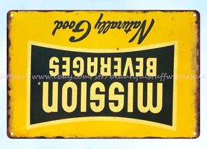 wall hangings in living room Mission Beverages metal tin sign