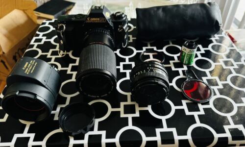 Canon T50 35MM Film Camera w/3 Lenses 50mm & 80-200mm Flash w/Bag Warranty Cards