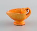 Kähler, Denmark. Cream jug in glazed stoneware. Beautiful orange uranium glaze.