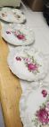 New ListingVintage Porcelain  Victoria  Austria  Hand Painted Rose Design  Set Of 5 Plates.