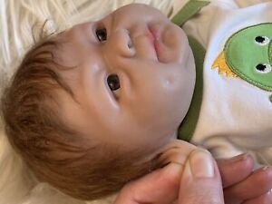 He Is  14-inch, full Body silicone Doll .