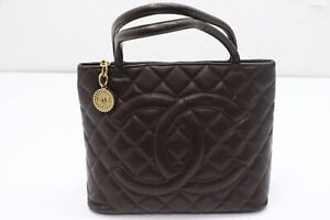 Chanel Gold Medallion Brown Caviar Quilted CC Hand Tote Bag