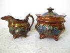 Antique Copper Luster Ware Creamer and Sugar w Painted Blue Grapes Pottery Leaf