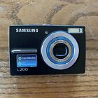 Samsung L200 10.2MP Compact Digital Camera W/Charging Cord, SD Card & Battery