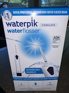 New ListingWaterpik Ultra Dental Easy Water Flosser 2 Tips and 1 Settings WP-360W White NEW