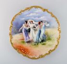 Limoges, France. Large antique dish in hand-painted porcelain with dancers.