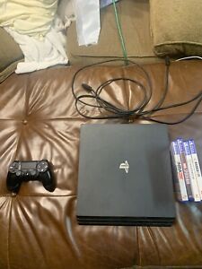 Slightly Used Sony PlayStation 4 Pro 1TB Console - Black  With Games