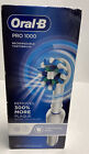 White Oral-B Pro 1000 Deep Clean Rechargeable Toothbrush#9636