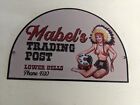 VINTAGE MABEL'S TRADING POST SPORTING GOODS STORE PORCELAIN SIGN USA INDIAN DIE