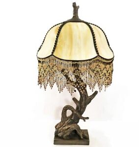 Beaded slag glass lamp. Aesthetic Movement style. Art Nouveau. Tree branch base.