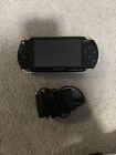 New ListingPlayStation Portable PSP-1001 Black Game Console (CHARGER INCLUDED)