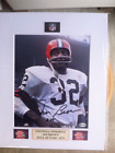 Signed Jim Brown 8x10 mounted to 11x14 color photo w/coa