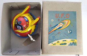 U.F.O Japan wind-up spaceship rocketship litho tin toy Yonezawa robot pilots X-7
