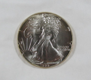 1986 $1 American Silver Eagle .999 Silver Uncirculated/BU Light Toning