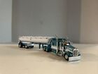 DCP 1/64 scale Kenworth W900L with MAC end dump trailer