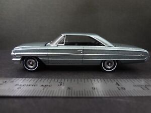 Auto World 1964 Ford Galaxie 500 XL silver smoke - Loose New Mint 1:64