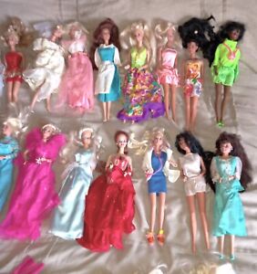 New Listing25 Barbie Dolls , Clothes and Misc.