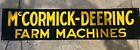 Vintage metal enamel McCormick-Deering Farm Machines sign