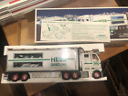 2003 HESS TOY TRUCK AND RACE CARS