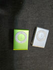 Lot of 2 Apple iPod Shuffle A1204 GREEN & Silver . 1 IS WORKING THE OTHER IS NOT