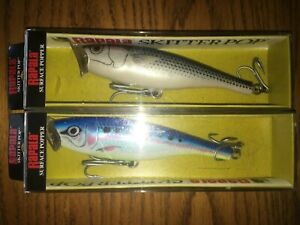 Rapala Saltwater Skitter Pop 12's==Lot of 2 DIFFERENT COLORED FISHING LURES