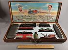 VINTAGE MARX HO TRAINS SET IN GRAPHIC CARRYING CASE, 7 CARS, TRACK, BOTTLE SMOKE