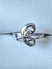 14k White Gold 1/6 ct (natural) Diamond Twisting Knot Ring, size 6-