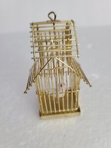 VTG SMALL METAL BIRD CAGE CHRISTMAS ORNAMENT WITH SWINGING BIRD GOLD TONE CAGE