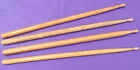 four tired, unmatched, beat up old drum sticks - Ludwig 5B (1)  regal tip 7A (1)