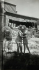 New ListingWoman & Boy Hugging By Mining Camp B&W Photograph 2.75 x 4.5