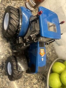 black and blue tractor toy