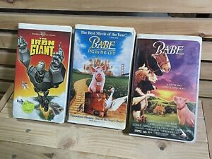 clamshell vhs lot ckildren's movies Iron Giant babe pig in the city