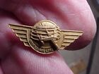 Neat old United Air Line 100,000 miles award pin back-Plane flying upside-down?