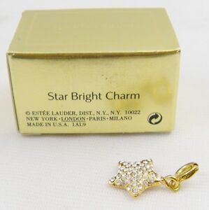 Estee Lauder Gold Tone Charm - Star Bright