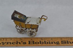 antique tin litho penny toy baby carriage w/baby Germany 3.5 in original 19th