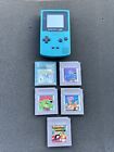 Nintendo Game Boy Color- CGB-001 with 5 Games Pokemon Crystal Version Working