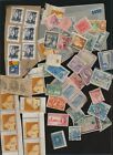B LOT OF 50+ ASSORTED WORLD STAMPS - #5550