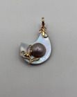 14K Yellow Gold Carved Mother of Pearl with center pearl Pendant