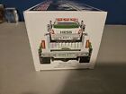 2011 hess toy truck and race car