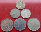 SIX ASSORTED SILVER COLOURED WORLD COINS / LOT 454