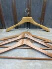 4 Vintage wooden hangers. 1 Setwell/3 unlabled
