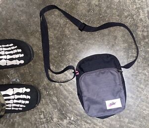 Nike Satchel Crossbody 'Bag Black/Grey/Pink' Cursive Nike font.