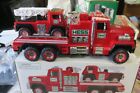 2015 HESS FIRE TRUCK AND LADDER RESCUE NEW ONLY OPEN TO REMOVE BATTERY'S