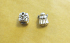 One lot of two Authentic Pandora Christmas charms, angel and present